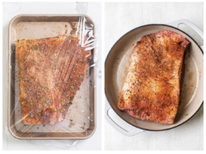 A brisket covered in spices shown wrapped in plastic wrap to dry brine overnight, and an uncooked brisket shown in a cast iron baking pot.